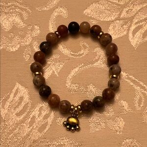 Chic Beaded Bracelet with Gold Accents and Paw Print Charm